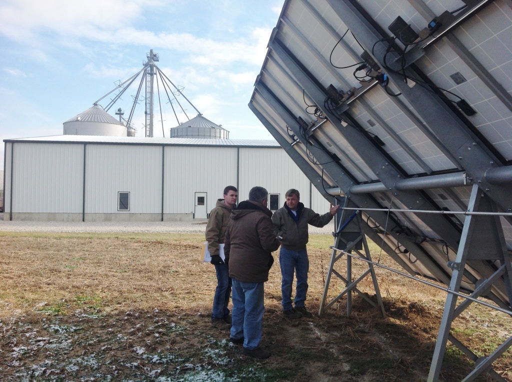 backside of solar PV panels on farm